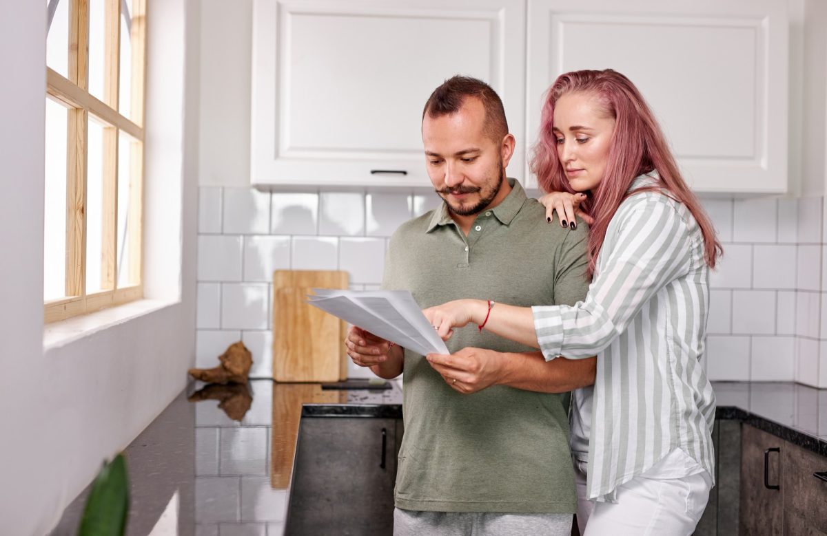 Couple Reading Home Inspection